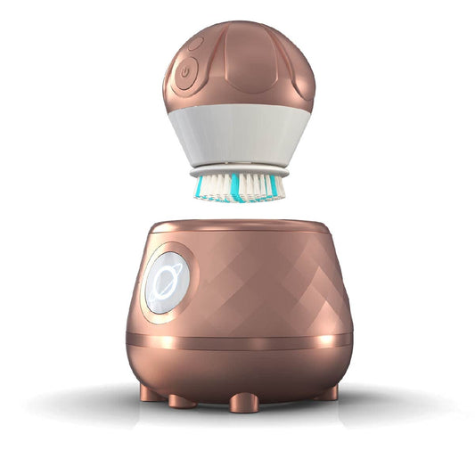 Éclat Bio – Brosse Nettoyante Orbitale pour le Visage avec Station de Nettoyage en rose.