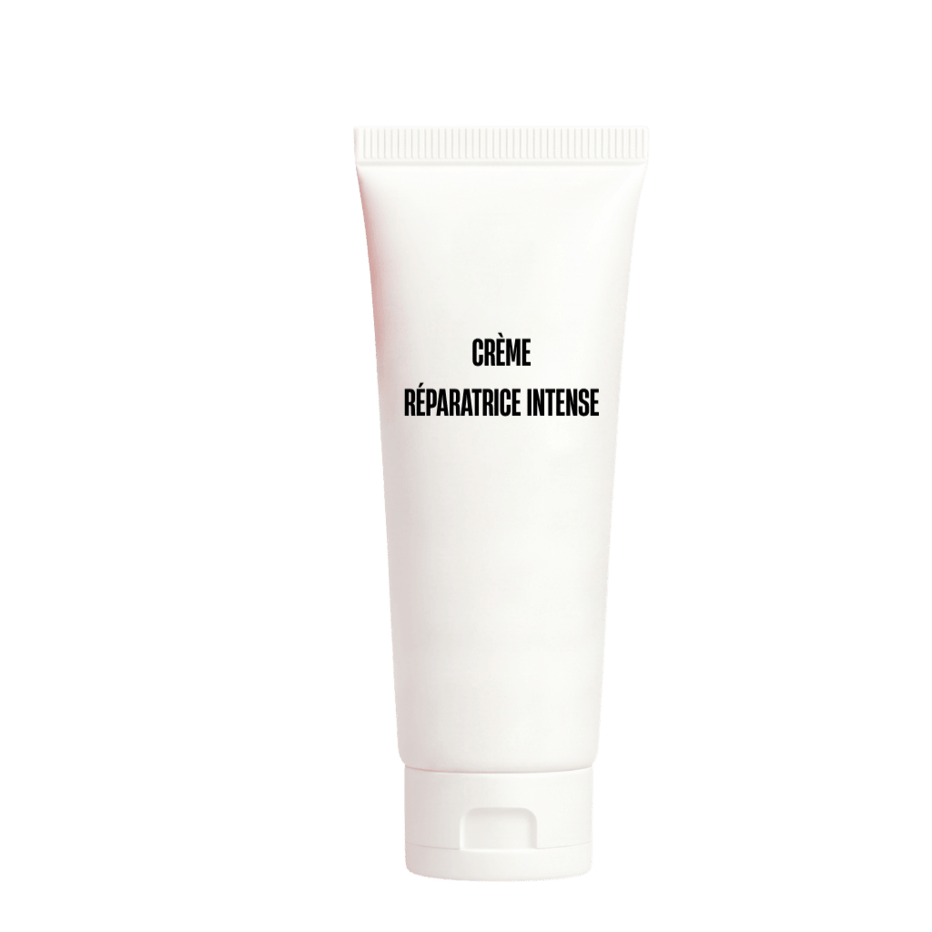 Crème réparatrice intense dans un tube blanc, idéale pour hydrater et adoucir la peau.